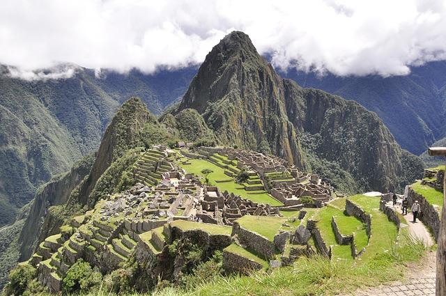 Machu Picchu is divided into two main areas the agricultural sector and the urban sector, which includes the main square, temples, and living quarters.